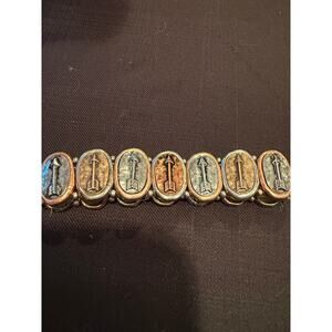 Silver and copper-toned Western style stretch 7” bracelet with engraved arrow